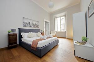 Postelja oz. postelje v sobi nastanitve 4BNB - Spacious Belli Apartment