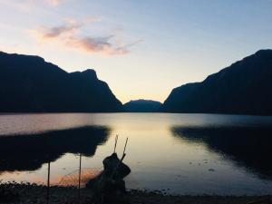 a view of a lake with mountains in the background at Frafjord Apartments Thor in Dirdal