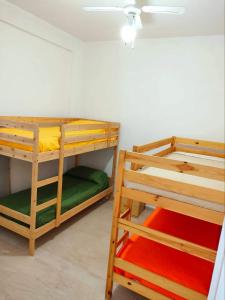 A bed or beds in a room at Appartamenti Cavataio 1