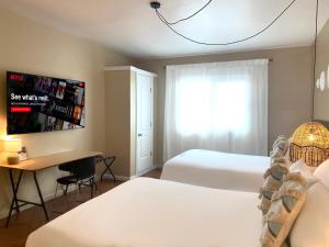 Cama ou camas em um quarto em Magnolia Inn