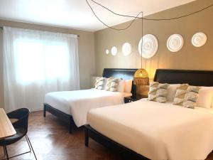 Cama ou camas em um quarto em Magnolia Inn