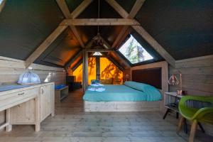 A bed or beds in a room at AgriResort Spa Glamping Poggio Di Montedoro