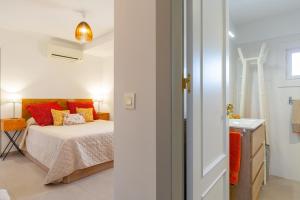 Harmony Villa by Fidalsa tesisinde bir odada yatak veya yataklar