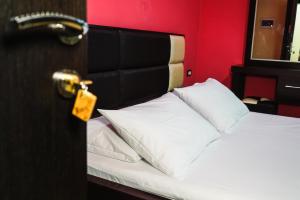 Voodi või voodid majutusasutuse Hotel Magic toas
