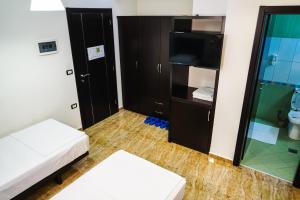 Voodi või voodid majutusasutuse Hotel Magic toas