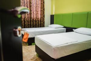 Voodi või voodid majutusasutuse Hotel Magic toas