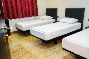 Voodi või voodid majutusasutuse Hotel Magic toas