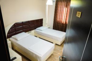 Voodi või voodid majutusasutuse Hotel Magic toas