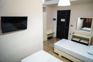 Voodi või voodid majutusasutuse Hotel Magic toas