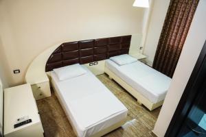 Voodi või voodid majutusasutuse Hotel Magic toas