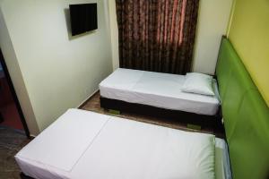 Voodi või voodid majutusasutuse Hotel Magic toas