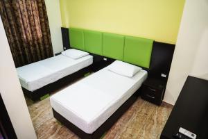 Voodi või voodid majutusasutuse Hotel Magic toas