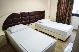 Voodi või voodid majutusasutuse Hotel Magic toas