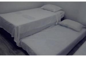 Postel nebo postele na pokoji v ubytování Villa Aurora
