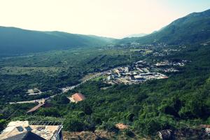 an aerial view of a town in a mountain at Top Jaz Apartments in Budva +10 photos