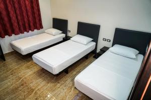Voodi või voodid majutusasutuse Hotel Magic toas