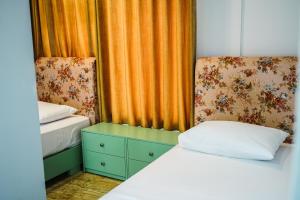 Postel nebo postele na pokoji v ubytování Hotel Magic