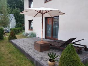 Ogród w obiekcie CYPRYS apartamenty dla rodzin z Dziećmi Władysławowo