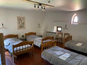 Postel nebo postele na pokoji v ubytování Gîte XL Familles et groupes Duilhac sous Peyrepertuse