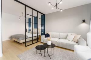 Posteľ alebo postele v izbe v ubytovaní Klif Apartamenty Polanki Aqua A414