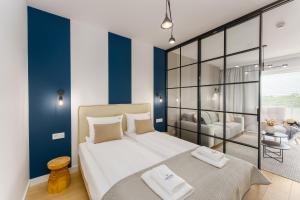 Posteľ alebo postele v izbe v ubytovaní Klif Apartamenty Polanki Aqua A414