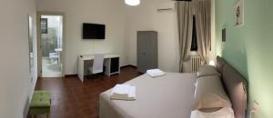 TV a/nebo společenská místnost v ubytování Relais LaValle
