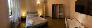 Postel nebo postele na pokoji v ubytování Relais LaValle + 37 fotografií