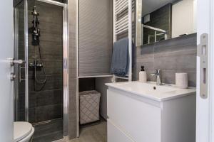 Kúpeľňa v ubytovaní City Lux Apartment 1- with garage and balcony + 22 fotografií