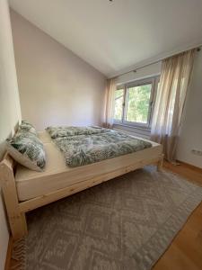 Postel nebo postele na pokoji v ubytování Ferienwohnung Erika
