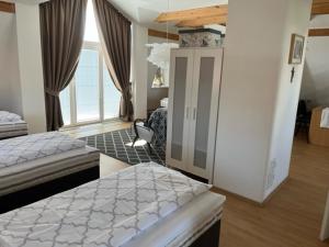 Postel nebo postele na pokoji v ubytování Villa Garden