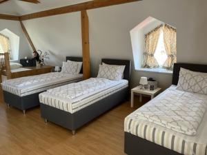 Postel nebo postele na pokoji v ubytování Villa Garden