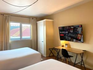 Cama ou camas em um quarto em Magnolia Inn