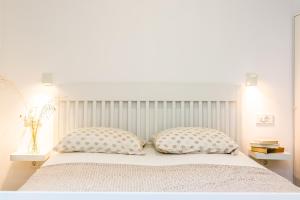 Postel nebo postele na pokoji v ubytování Adris apartments