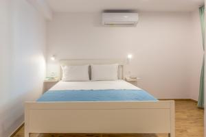 Postel nebo postele na pokoji v ubytování Adris apartments