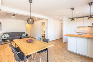 Kuchyň nebo kuchyňský kout v ubytování Adris apartments