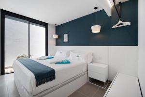 Posteľ alebo postele v izbe v ubytovaní Lola Sea Villa