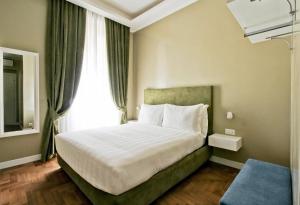 A bed or beds in a room at The river corner