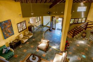 an overhead view of a living room with furniture at Pousada Y-Goá in Bertioga