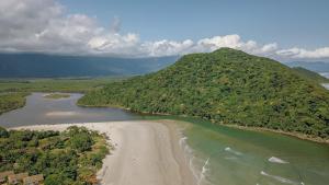 an aerial view of a river and a mountain at Pousada Y-Goá in Bertioga