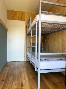Poschodová posteľ alebo postele v izbe v ubytovaní Haus Allod 208