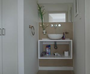 a bathroom with a sink and a mirror at Josefina in Ushuaia +30 photos