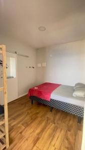 מיטה או מיטות בחדר ב-VidigalHouse Apartamento Vista Mar e Hidro