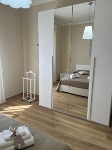 A bed or beds in a room at Casa vacanze l’orchidea