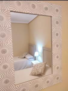 Cama o camas de una habitación en Casa de Huéspedes Vecinodecerbantes