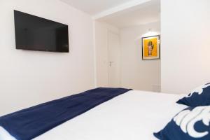 Posteľ alebo postele v izbe v ubytovaní Vitelli Apartments and Rooms