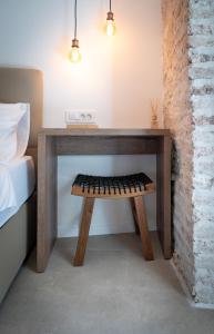 Posteľ alebo postele v izbe v ubytovaní Vitelli Apartments and Rooms