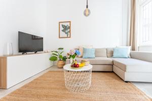 Televízia a/alebo spoločenská miestnosť v ubytovaní Maison de Fashion Apartment