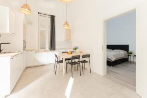 Posteľ alebo postele v izbe v ubytovaní Maison de Fashion Apartment