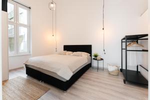 Posteľ alebo postele v izbe v ubytovaní Maison de Fashion Apartment