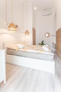 Posteľ alebo postele v izbe v ubytovaní Maison de Fashion Apartment